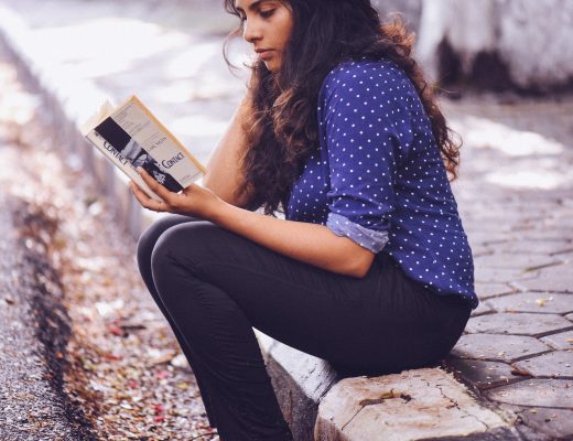 woman reading book