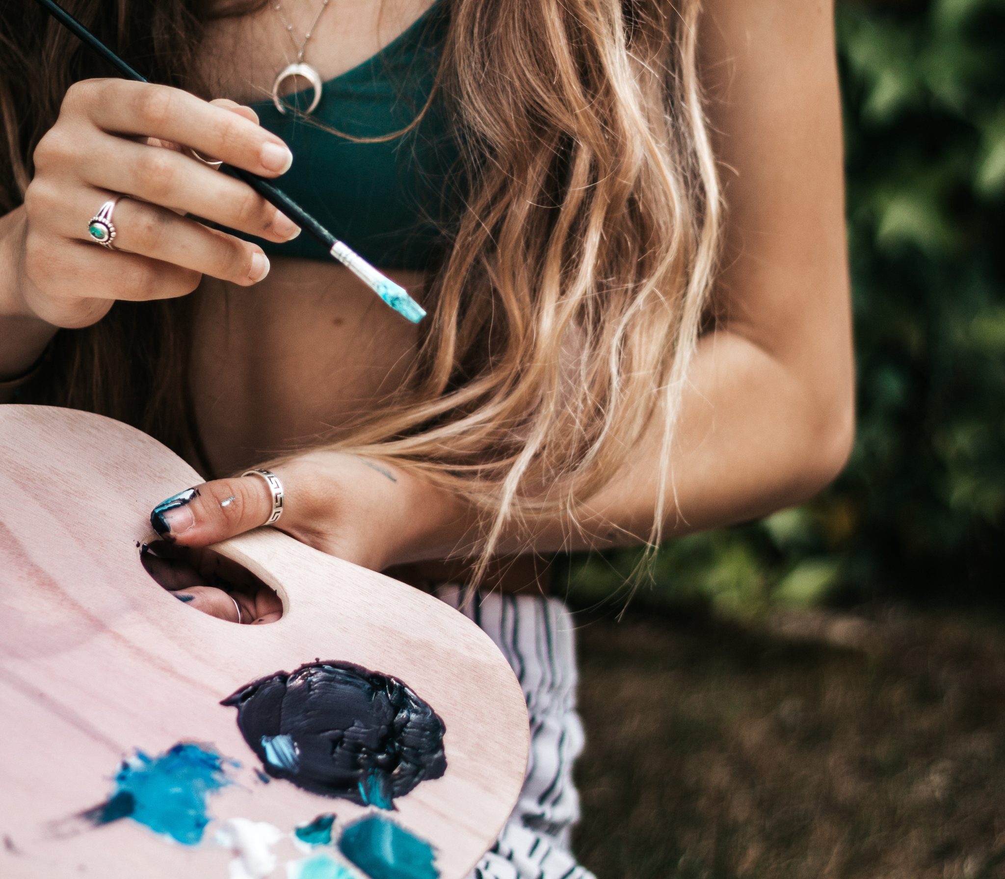 woman with paintbrush