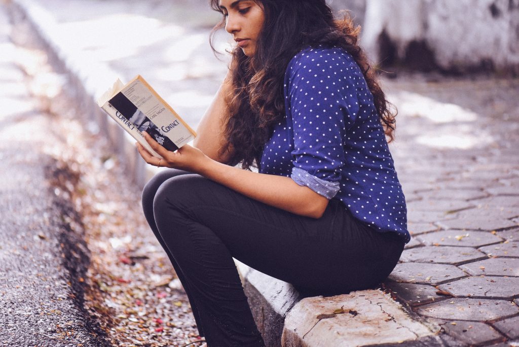 woman reading book