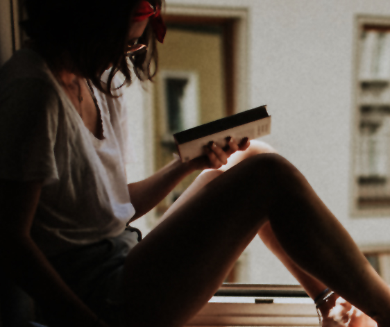 woman holding book